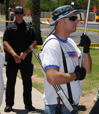 Illustration for article titled John Crawford Case: It’s Open Carry for Whites and Open Season on Blacks